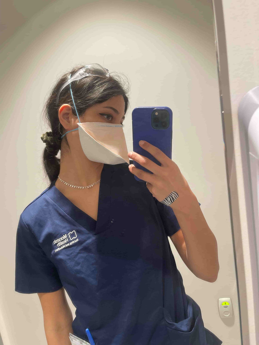 Lily in nursing scrubs